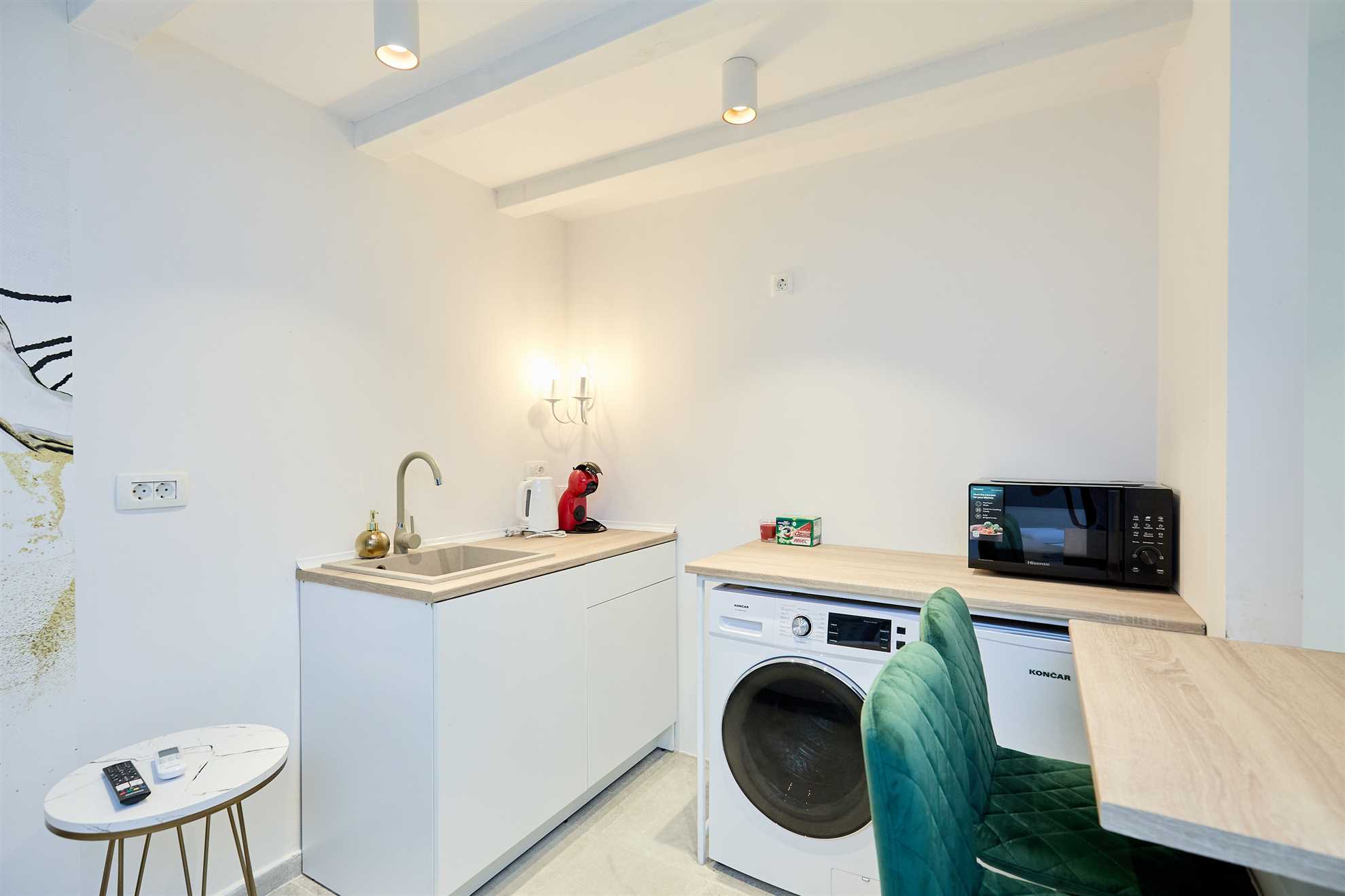 Karma Suites by Dominium Studio ground floor