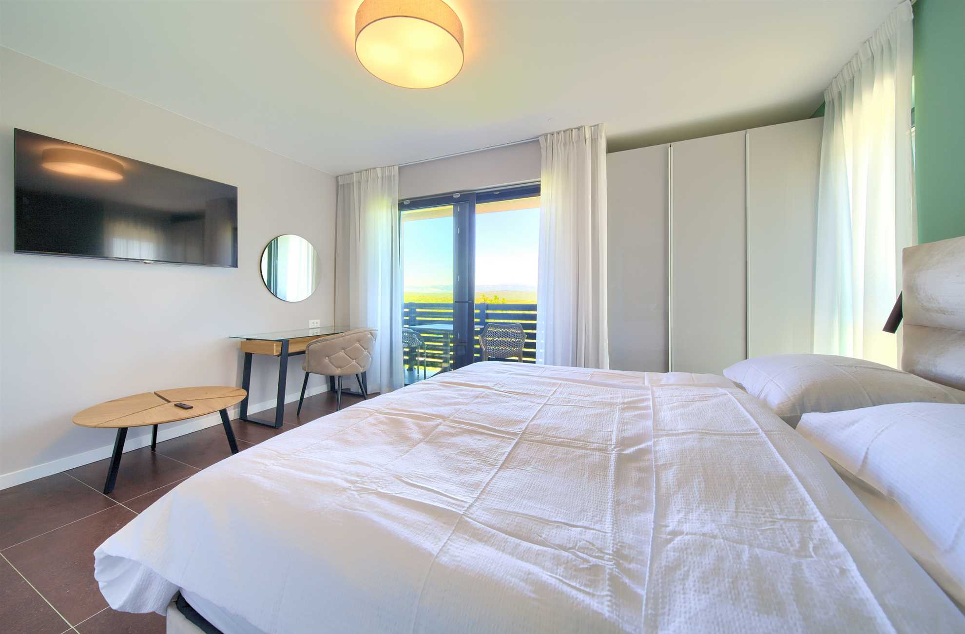 Vila ASTRUM s grijanim unutarnjim i vanjskim bazenom, jacuzzijem i saunom