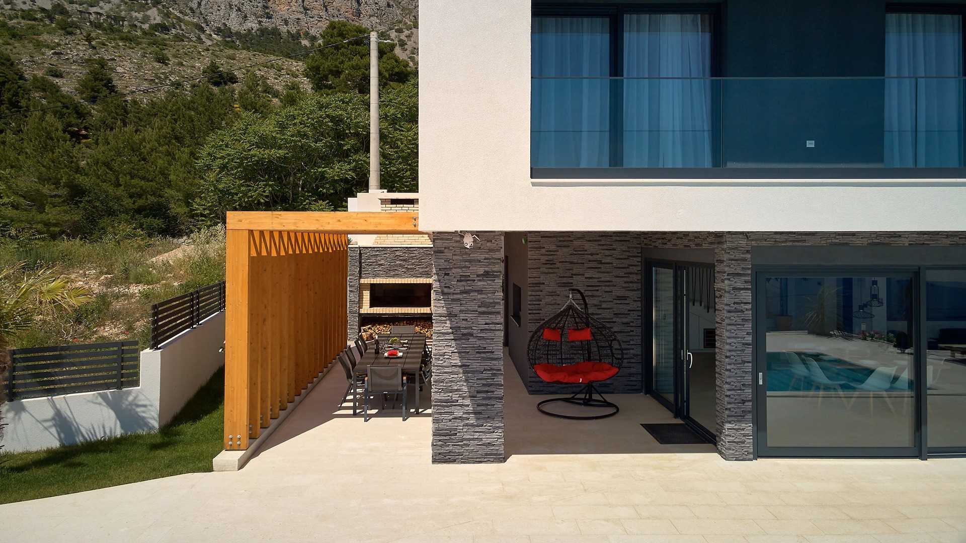 A modern villa with a pool and an amazing sea view