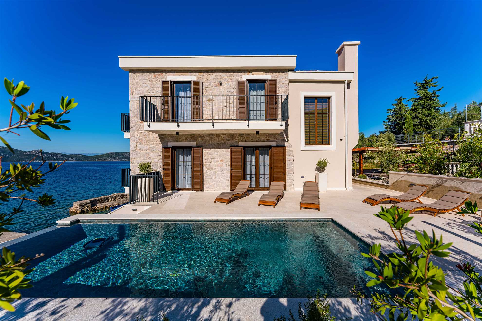 Sea front Villa Draga with heated infinity pool
