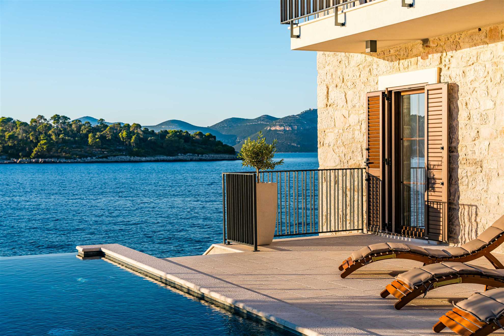 Sea front Villa Draga with heated infinity pool