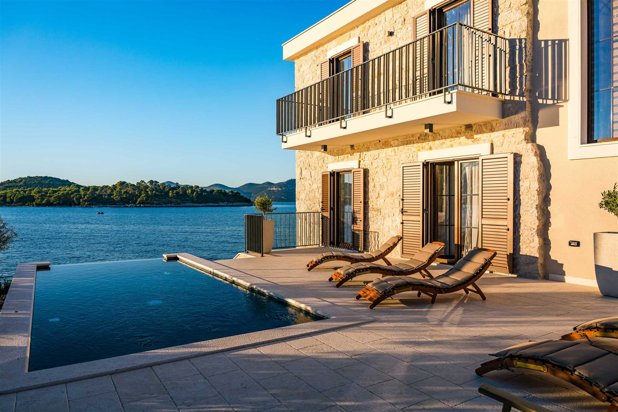 Sea front Villa Draga with heated infinity pool