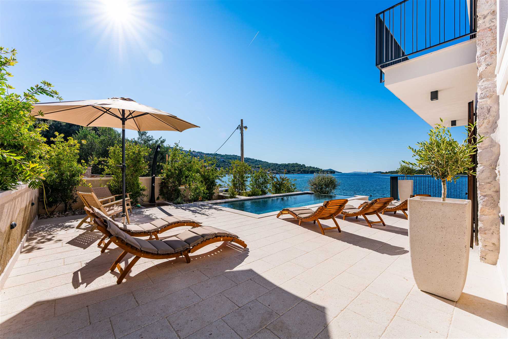 Sea front Villa Draga with heated infinity pool