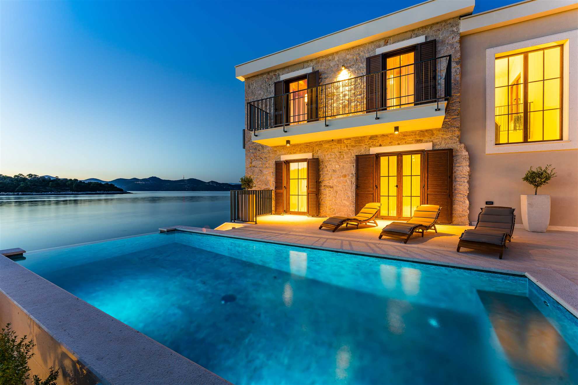 Sea front Villa Draga with heated infinity pool