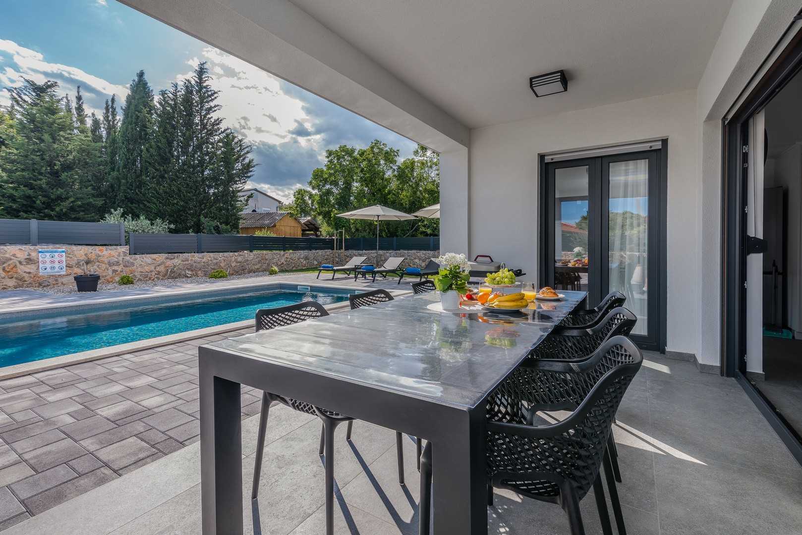 Holiday house TARA & LANA II with heated pool