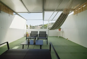 Split 2-Bedroom Apartment with Terrace & Park View