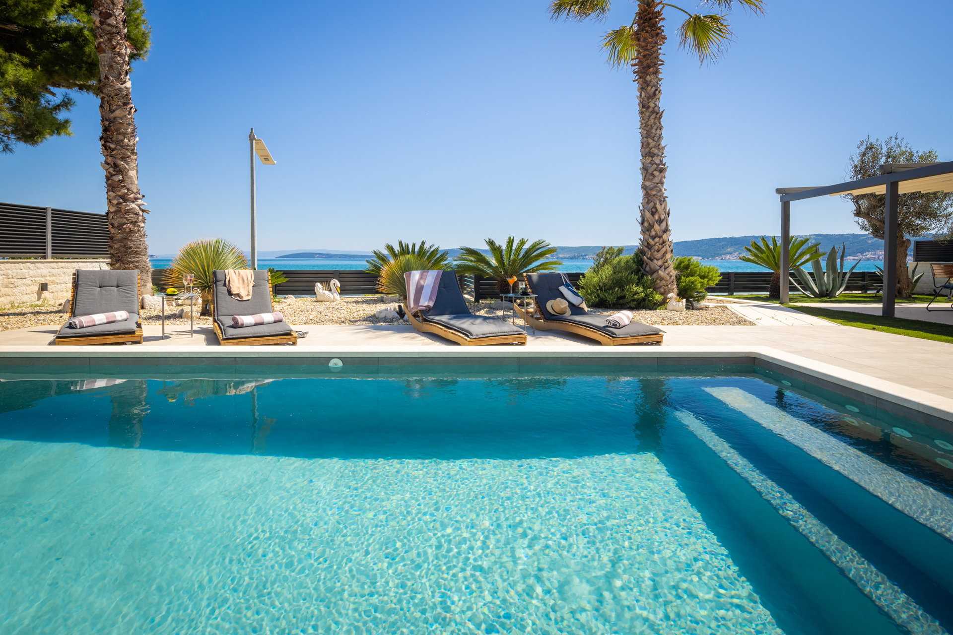 Beachfront Villa Tota with Pool