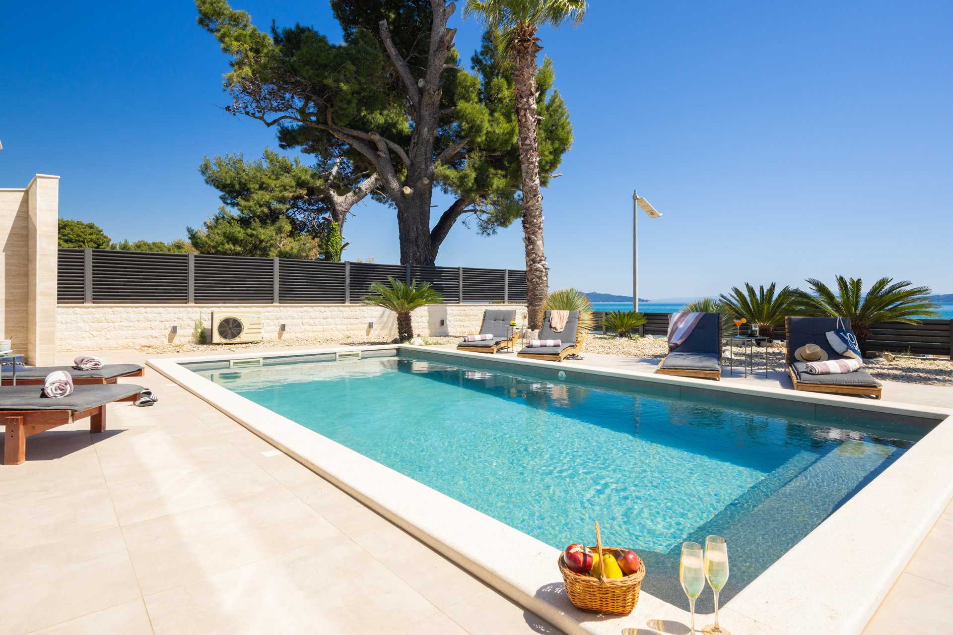 Beachfront Villa Tota with Pool