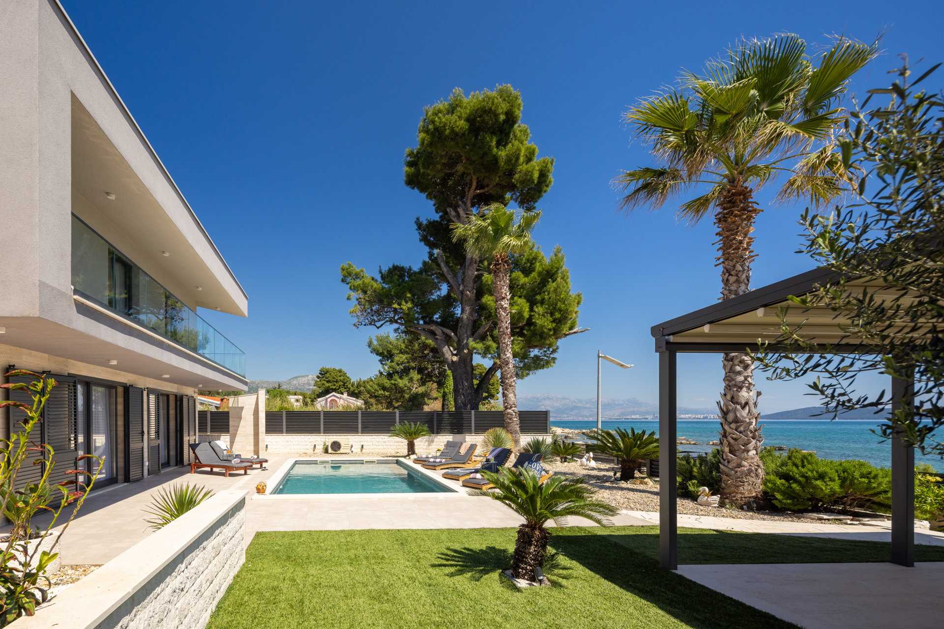 Beachfront Villa Tota with Pool