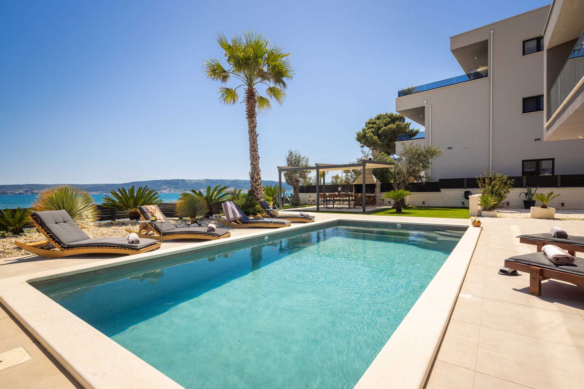 Beachfront Villa Tota with Pool